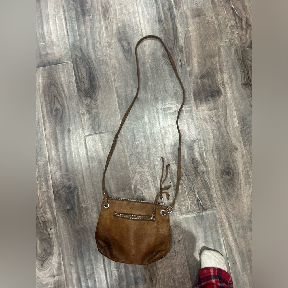 Roots over the shoulder purse 👜